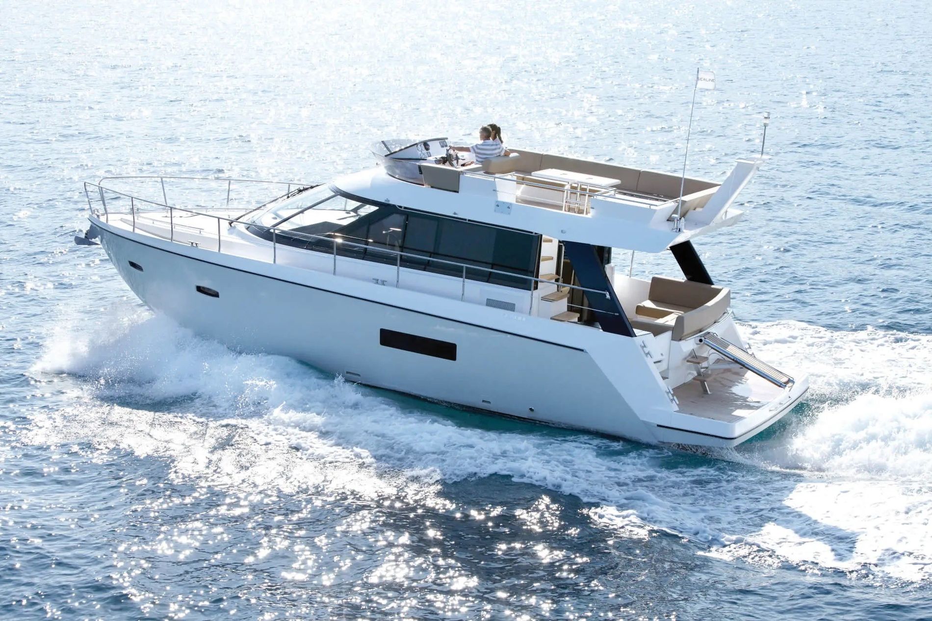 Sealine F450 motor yacht cruising on open water